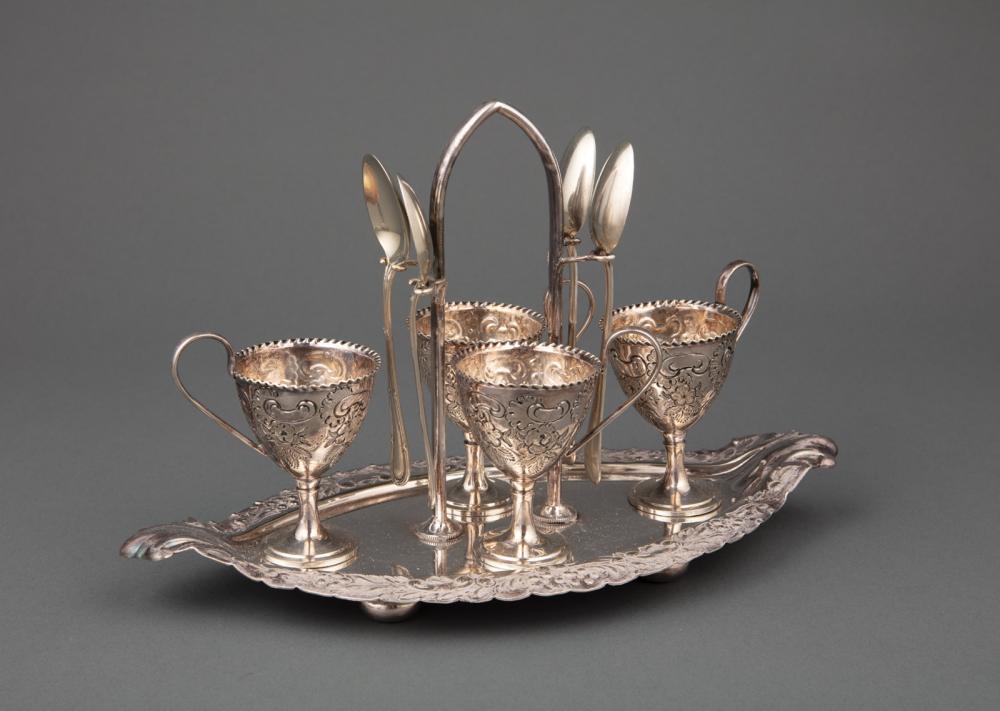 Appraisal: Late Victorian Silverplate Egg Cruet Walker Hall Sheffield navette-form stand