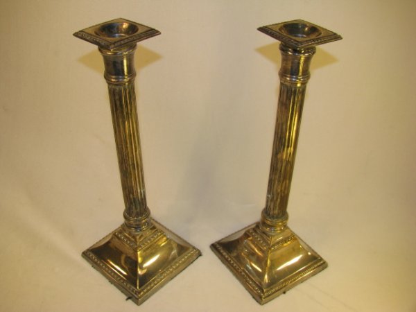 Appraisal: Pair of William Adams Towle Co candlesticks crafted in India