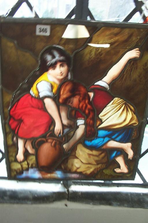 Appraisal: A th century painted and leaded glass panel showing two