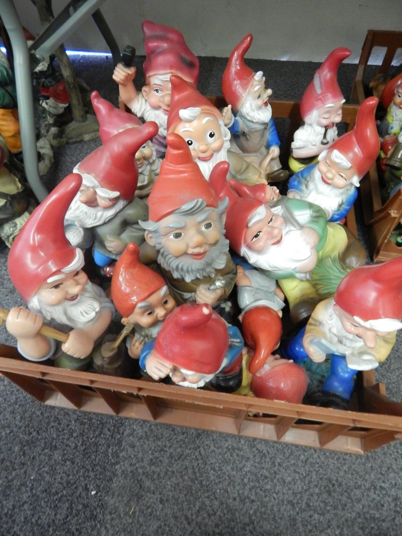 Appraisal: A large quantity of plastic garden gnomes each with a