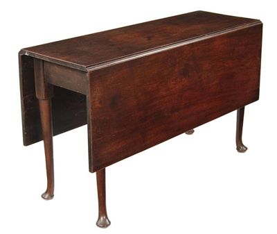 Appraisal: A George II mahogany drop-leaf table the rectangular top on