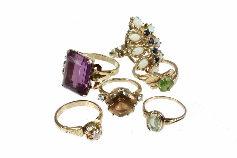 Appraisal: LADY'S RING LOT - gold and gem-set rings include a