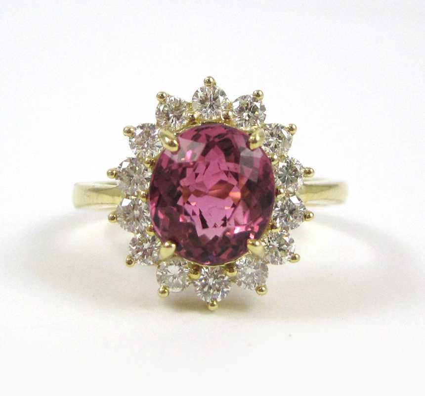 Appraisal: PINK TOPAZ DIAMOND AND FOURTEEN KARAT GOLD RING with round-cut