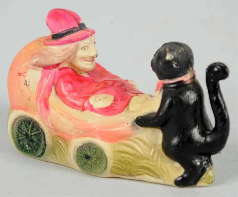 Appraisal: Rare Halloween Celluloid Witch in Cart Cart is pulled by