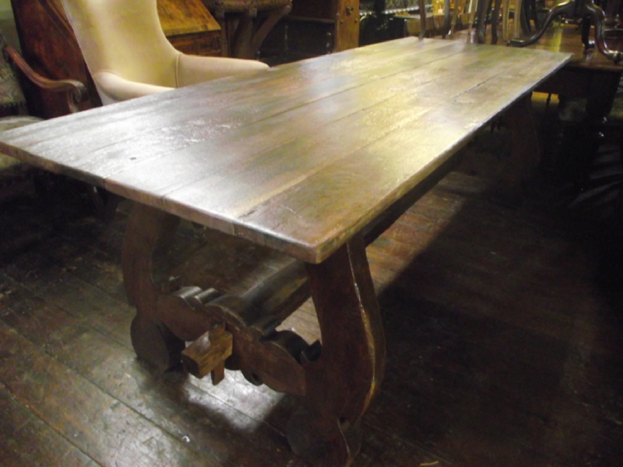 Appraisal: A substantial Spanish refectory table the hardwood top planked and