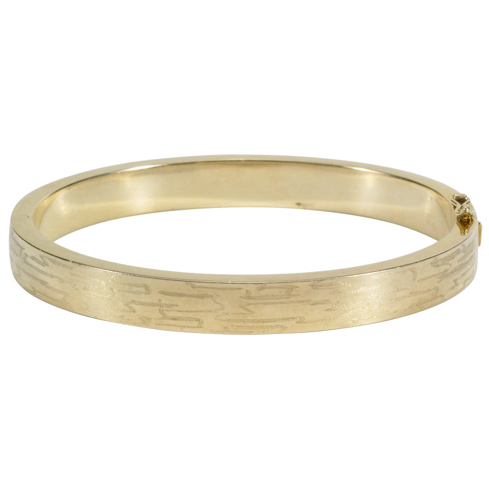 Appraisal: English k Yellow Gold Hinged Bangle with engraved decoration g