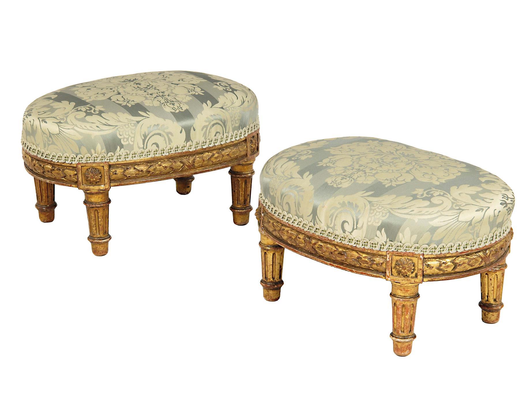 Appraisal: A pair of French giltwood oval low stools