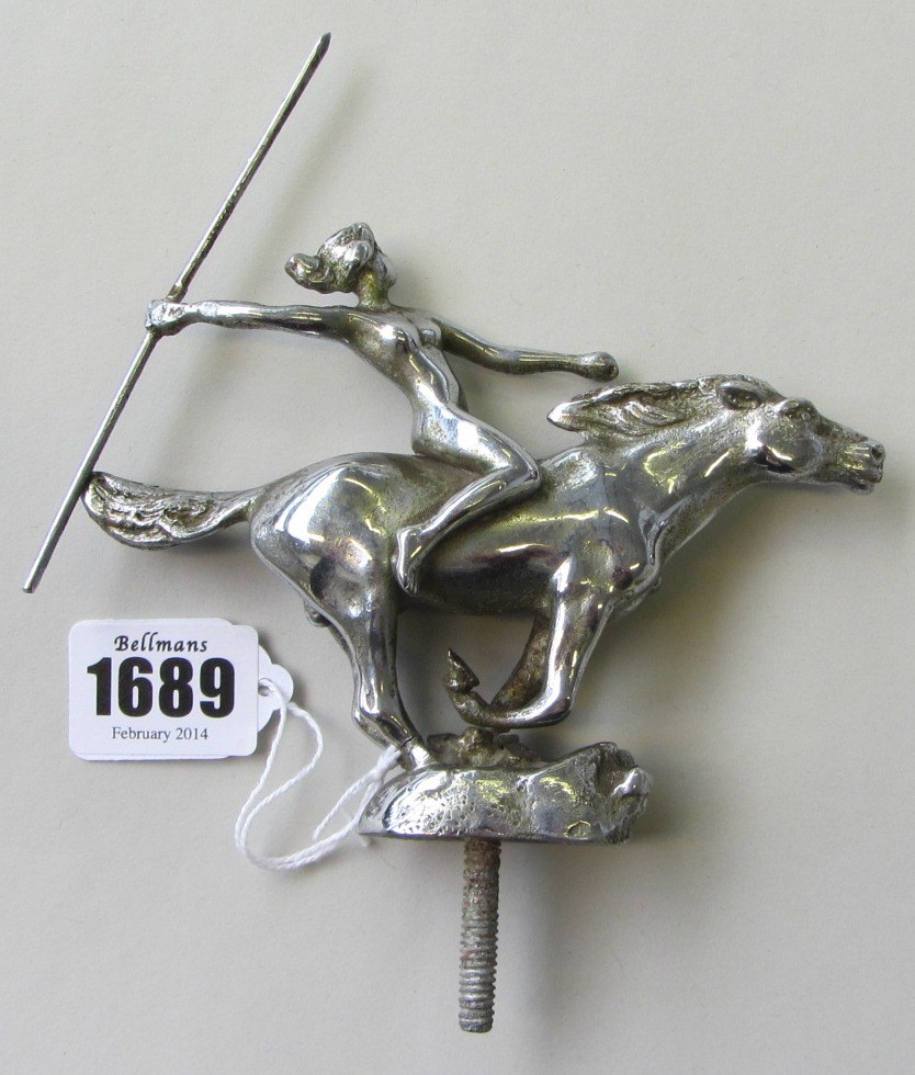 Appraisal: A chrome plated car mascot modelled as a female huntress