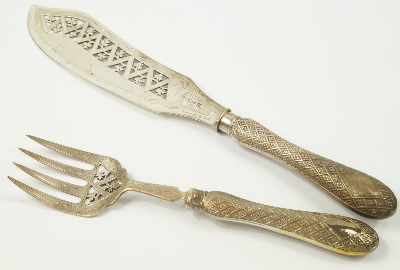 Appraisal: A pair of Victorian silver fish servers with floral and