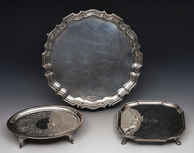 Appraisal: A VICTORIAN SILVER SALVER with piecrust border by Walker Hall