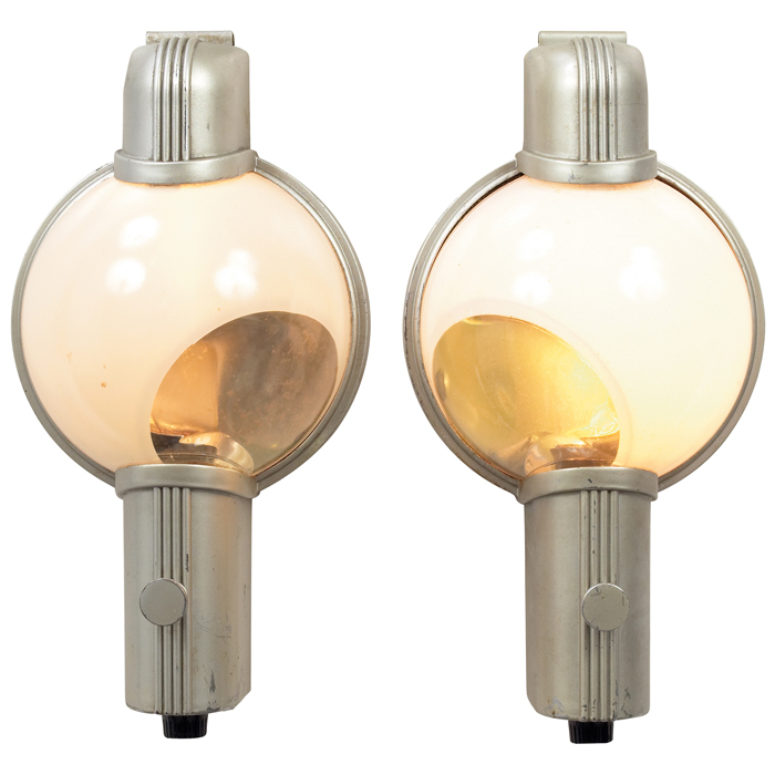 Appraisal: Henry Dreyfuss '' th Century Limited''train sconces pair glass and