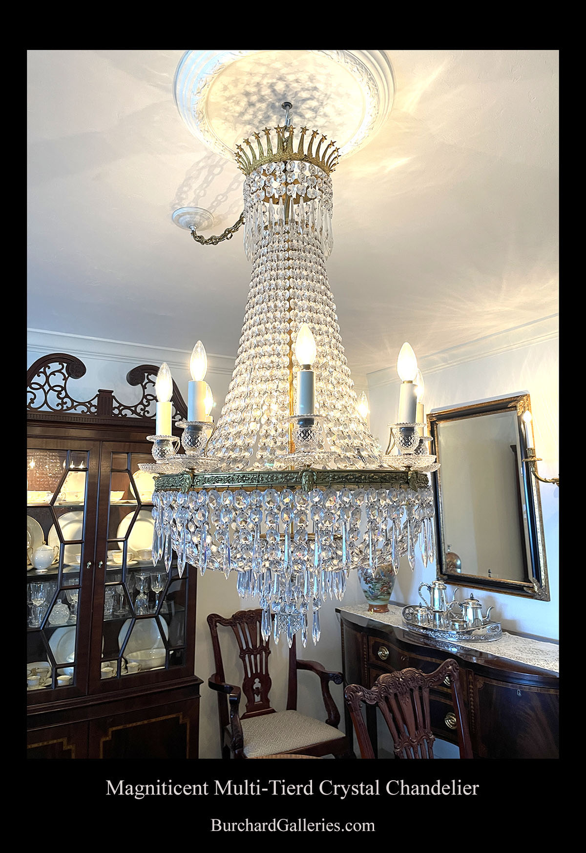 Appraisal: MAGNIFICENT LIGHT TIERED CRYSTAL CHANDELIER Late th-century surmounting metal star