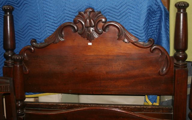 Appraisal: A richly carved Australian cedar double bed