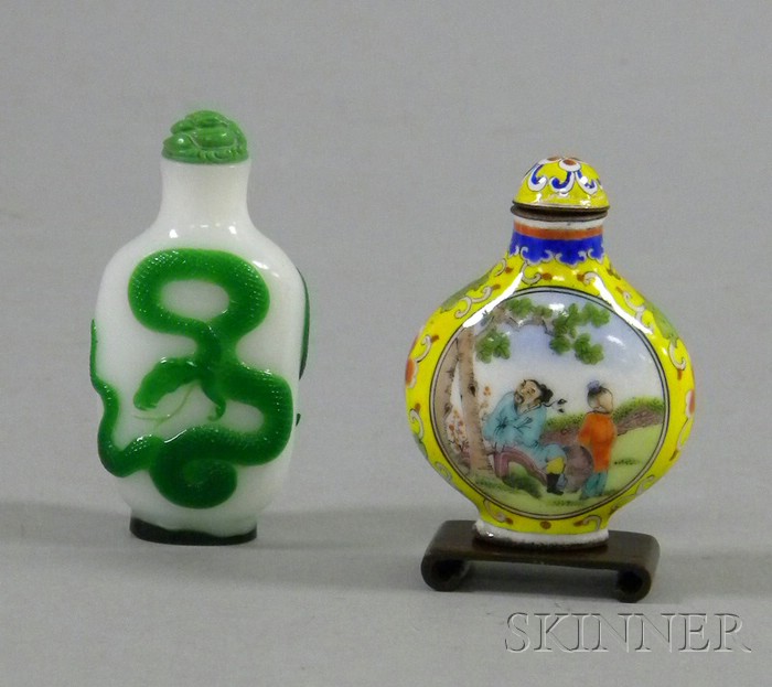 Appraisal: Two Asian Snuff Bottles enameled with figures and carved green