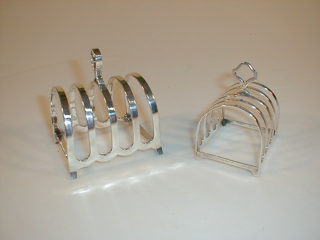 Appraisal: Two silver five-bar toast racks Sheffield and Birmingham ozs gross