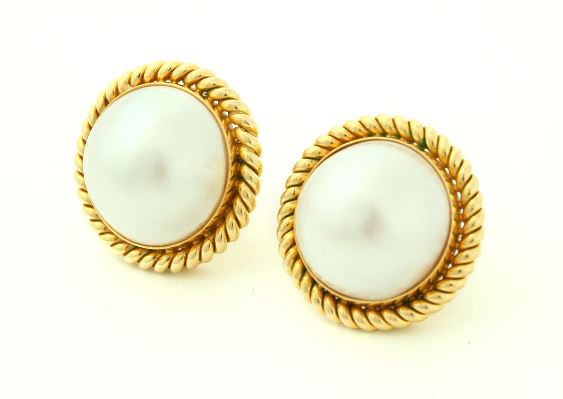 Appraisal: PEARL EARRINGS Twentieth century mm mabe' pearls surround K yellow