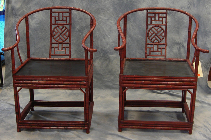 Appraisal: Pr red lacquer rattan wrapped bamboo armchairs black lacquer seats