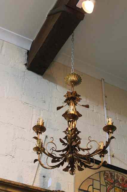 Appraisal: A PAIR OF GILT METAL SIX BRANCH HANGING CHANDELIERS of