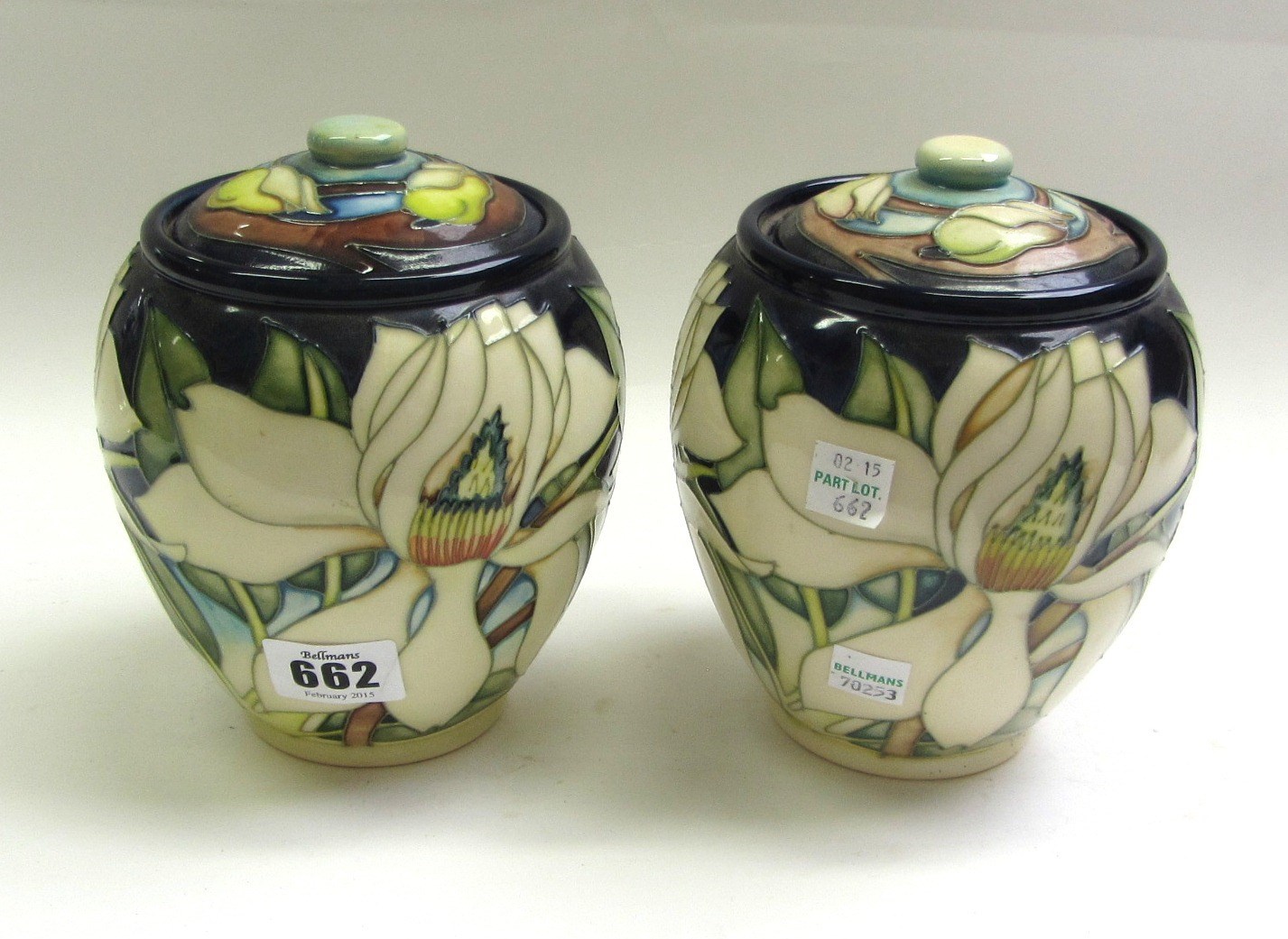 Appraisal: A pair of Moorcroft pottery ginger jars and covers circa