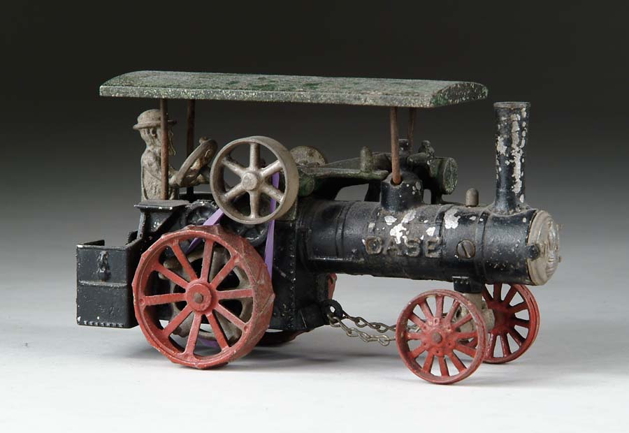 Appraisal: DIECAST CASE TRACTOR Depicting early steam-powered farm tractor SIZE l