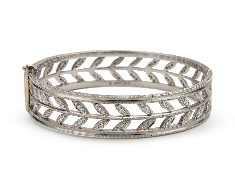 Appraisal: Platinum and Diamond Bangle Bracelet Platinum and Diamond Bangle Bracelet