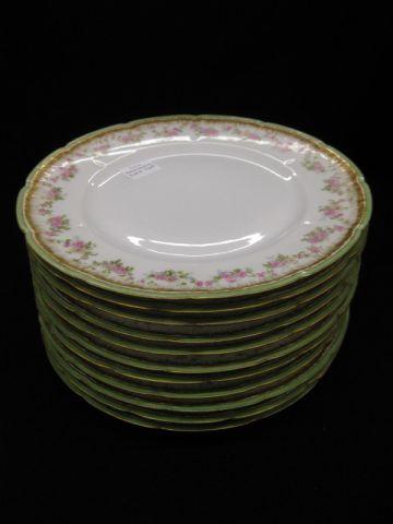 Appraisal: Limoges Porcelain Dinner Plates fine floral green gold border excellent