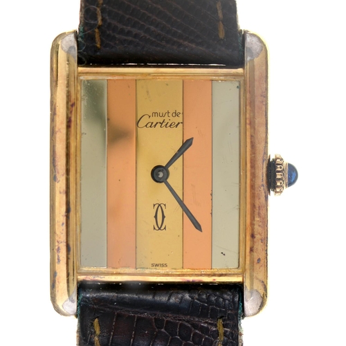 Appraisal: A Cartier silver gilt wristwatch Tank with striped dial mechanical