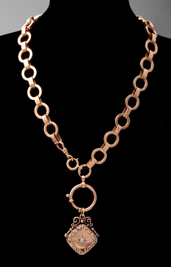 Appraisal: EDWARDIAN ROSE GOLD NECKLACE LOCKET A hard to find antique