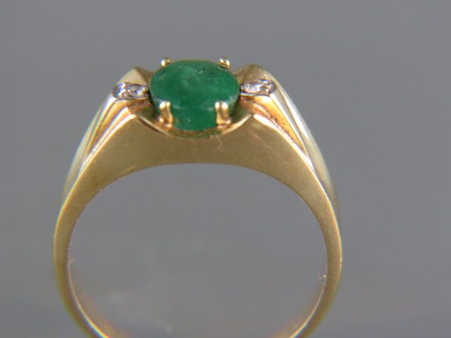 Appraisal: Emerald Diamond Man's Ring oval gem weighing carats with diamond