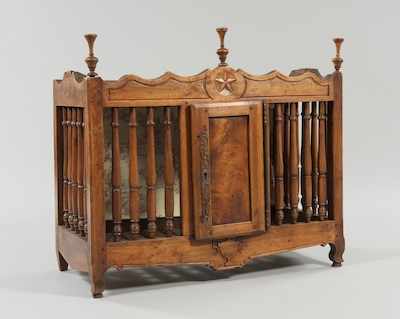 Appraisal: A French Provincial Panetiere A French walnut panetiere - bread