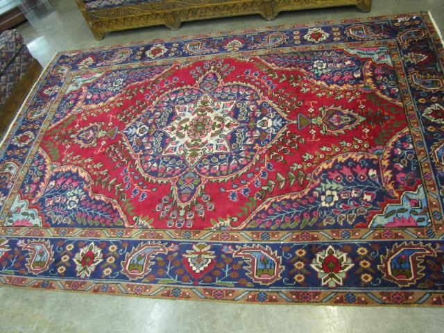 Appraisal: Oriental rug ' '' x ' '' Tabriz red field