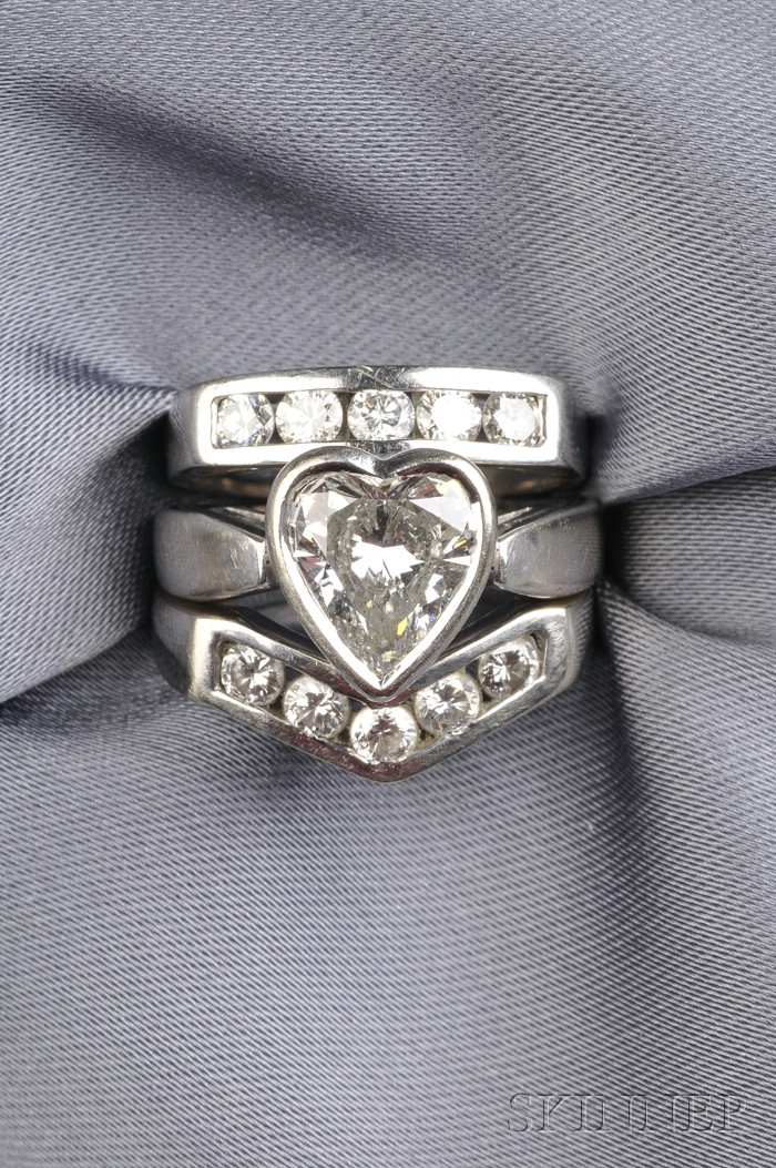 Appraisal: Diamond Solitaire bezel-set with a heart-shaped diamond weighing approx cts