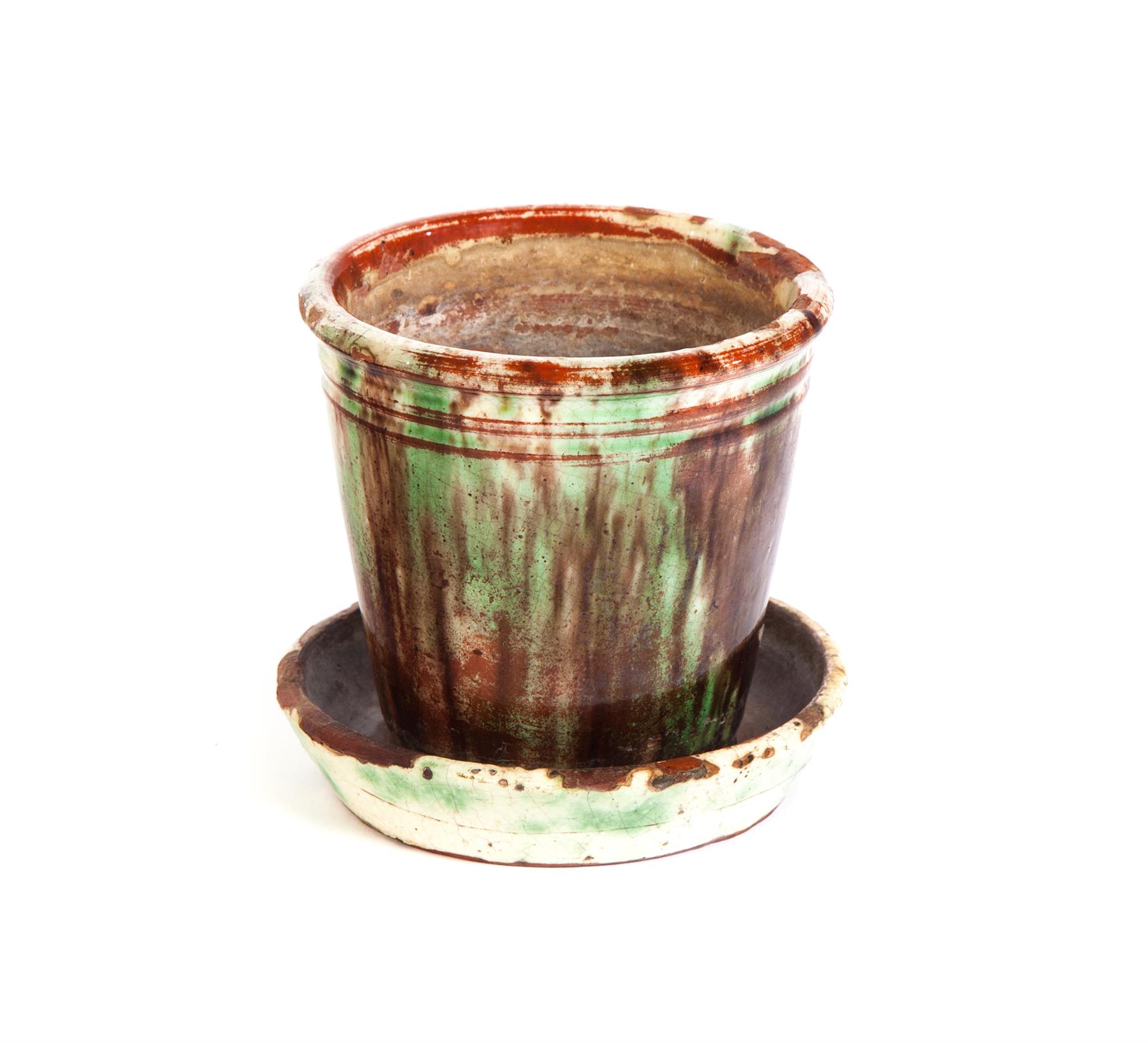 Appraisal: SHENANDOAH-TYPE HIGH GLAZE FLOWER POT Twentieth century Redware with green