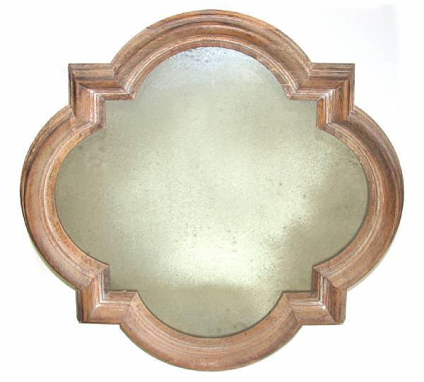 Appraisal: A Baroque style oak quatrelobed wall mirror height in width