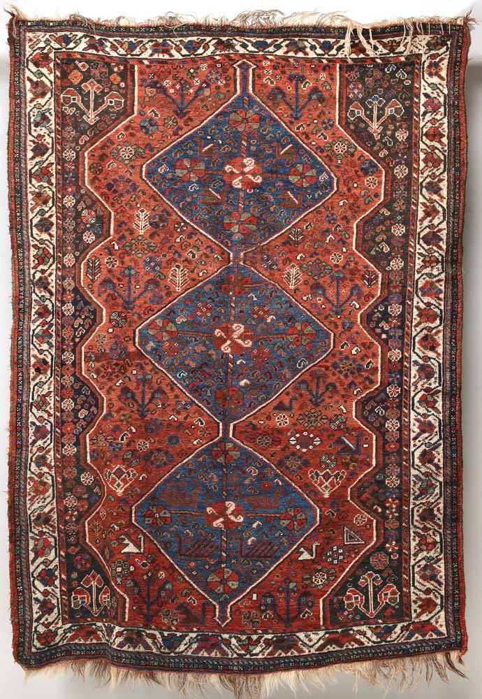 Appraisal: AN ANTIQUE KAMSEH SOUTHWEST PERSIAN ORIENTAL RUG The chestnut red