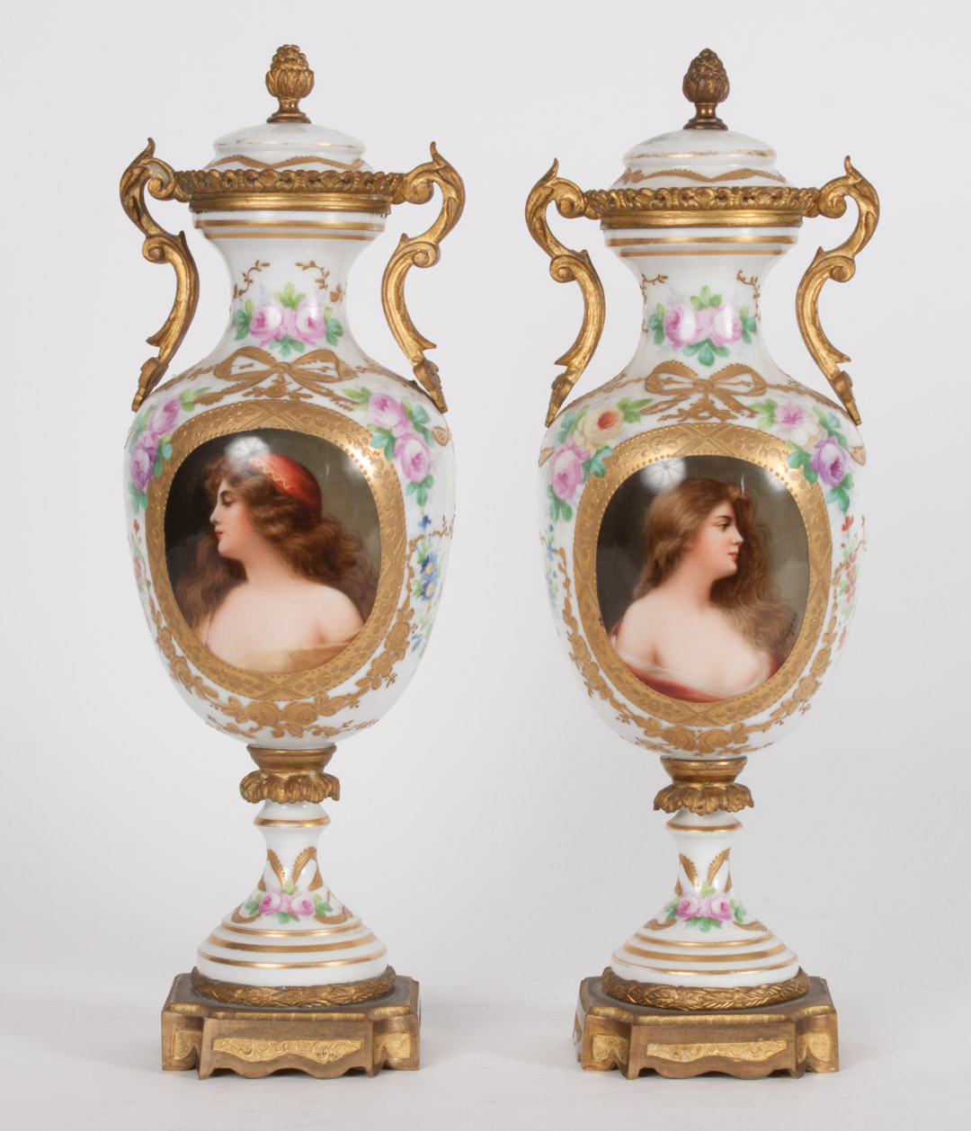 Appraisal: Pair of German gilt-metal-mounted porcelain urns late th century each