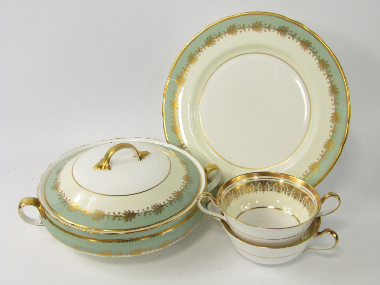 Appraisal: An Aynsley porcelain part dinner service decorated with gilt leaves