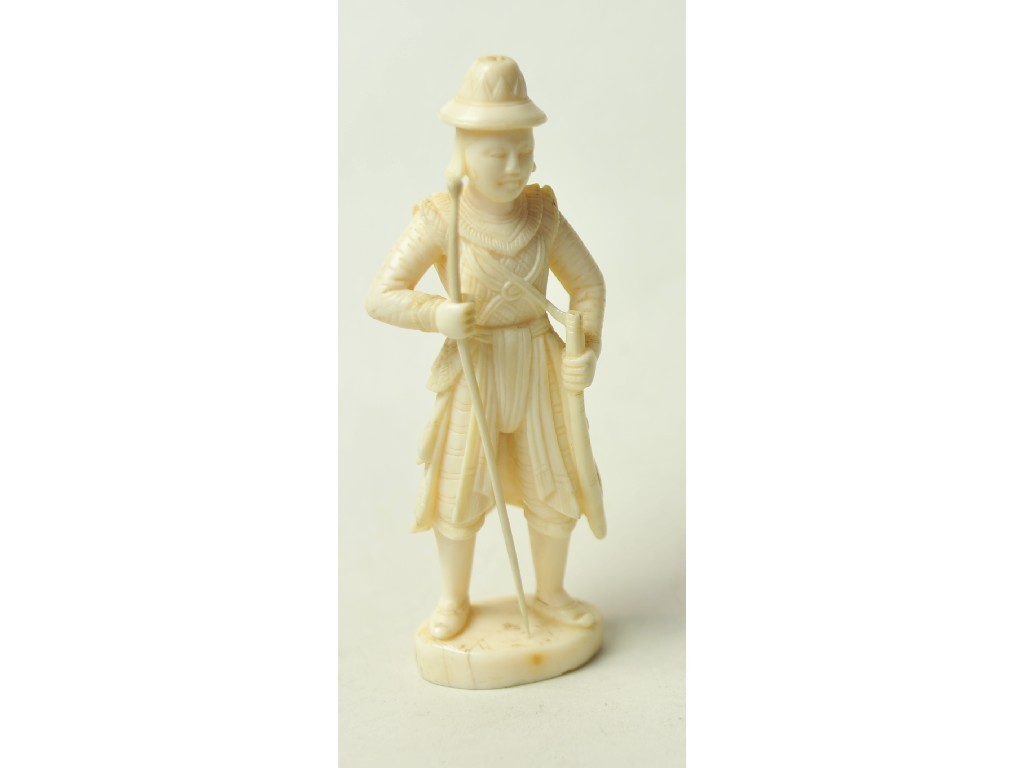 Appraisal: Carved ivory figure of a soldier