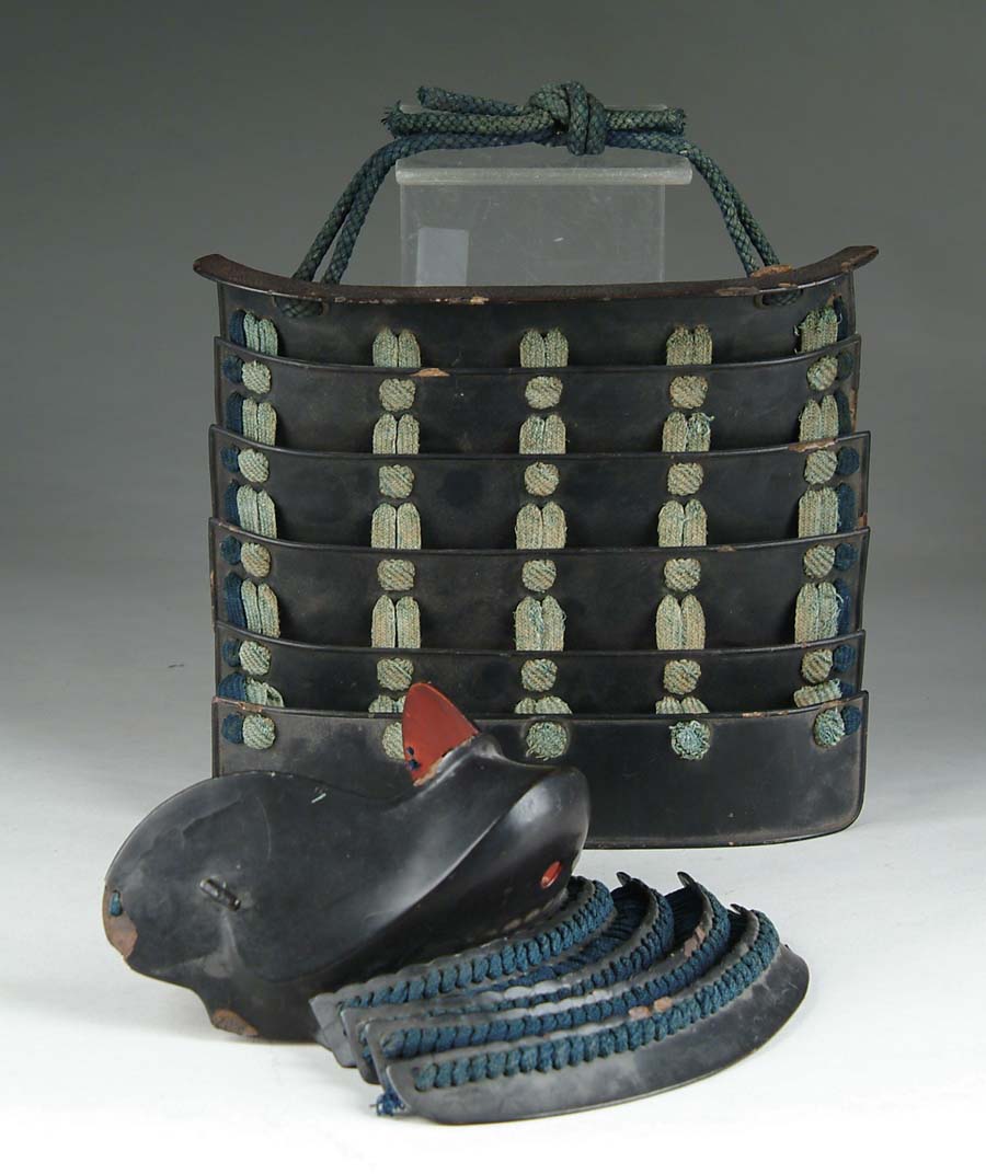 Appraisal: JAPANESE ARMOR Includes chin guard with plates Red enamel inside