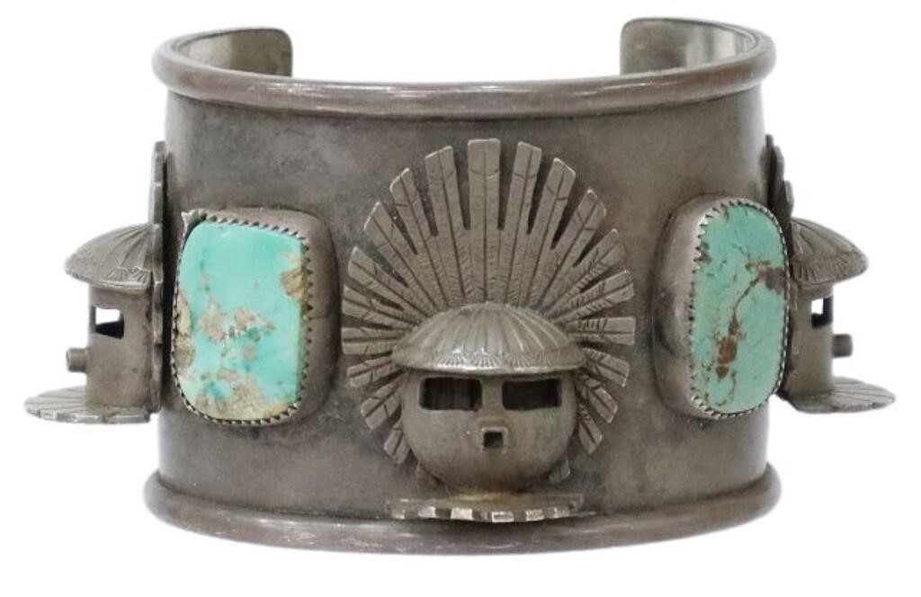 Appraisal: Native American sterling silver cuff bracelet with three-dimensional Kachina masks