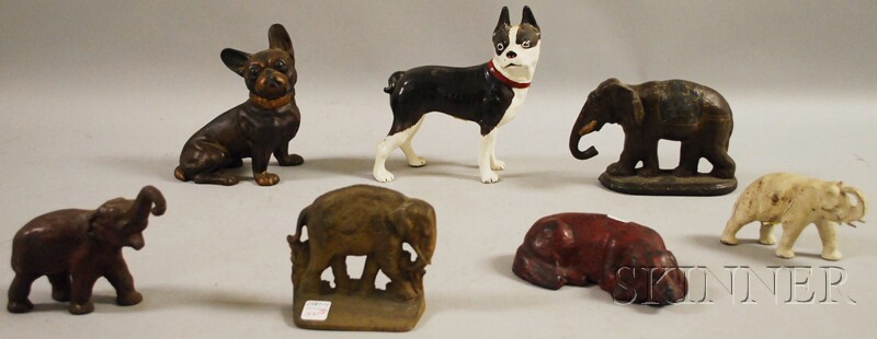 Appraisal: Four Painted Cast Iron Elephant and Three Dog Figural Doorstops