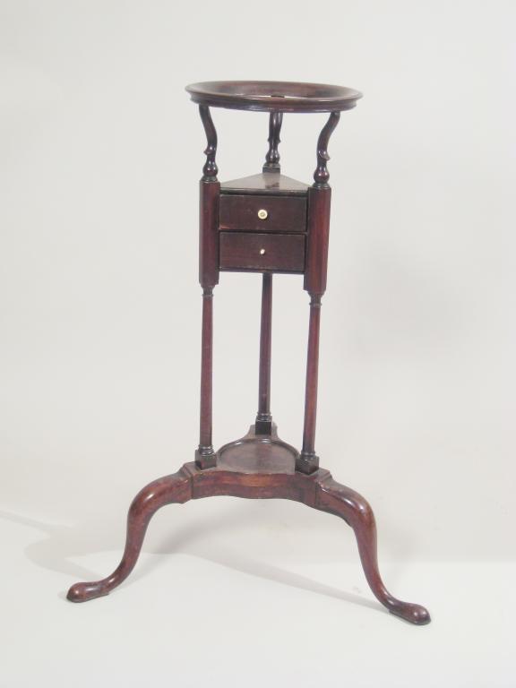 Appraisal: A Georgian mahogany Bowl Stand fitted two drawers tiered supports