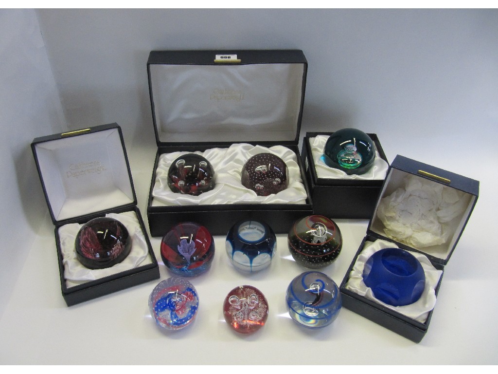 Appraisal: Eleven Caithness paperweights including Scarab Touchdown Octet Solitaire etc