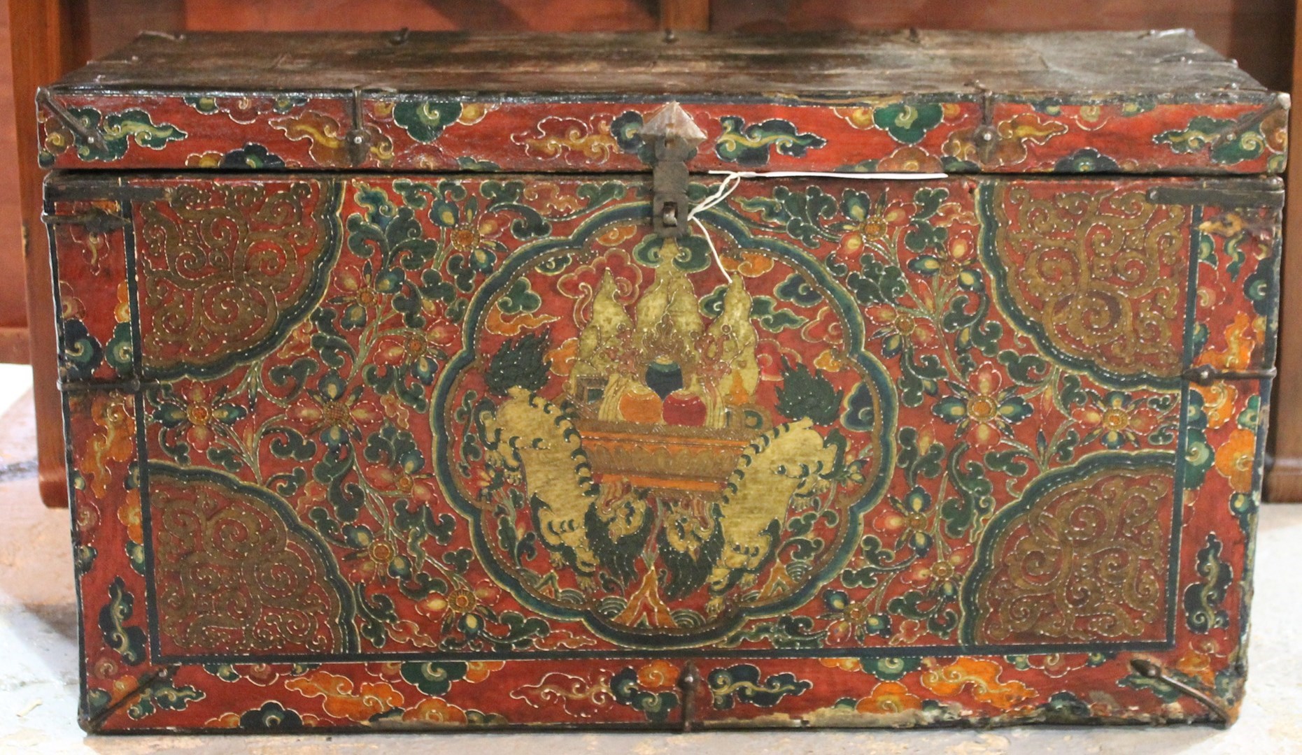 Appraisal: A th century Eastern iron bound hide veneered and red