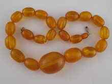 Appraisal: An amber necklace approx grams largest bead approx x cm