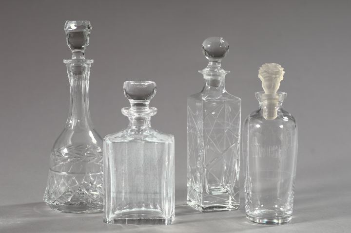 Appraisal: Collection of Four Cut or Engraved Glass Decanters comprised of