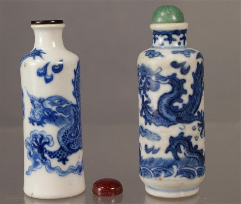 Appraisal: Cylindrical porcelain snuff bottles with blue underglaze dragon seeking flaming