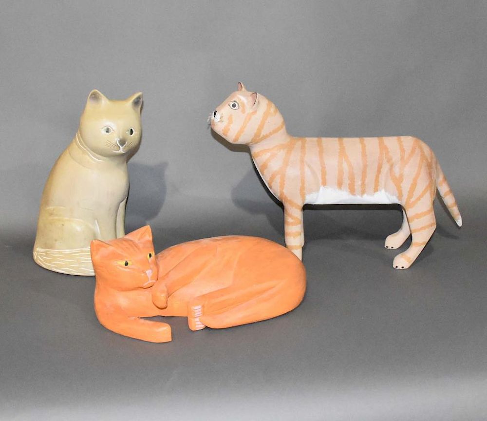 Appraisal: carved wooden cats carved wooden cats seated cat is H