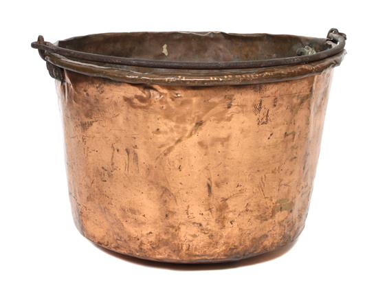 Appraisal: Sale Lot A Copper Cauldron with swing iron handle Height