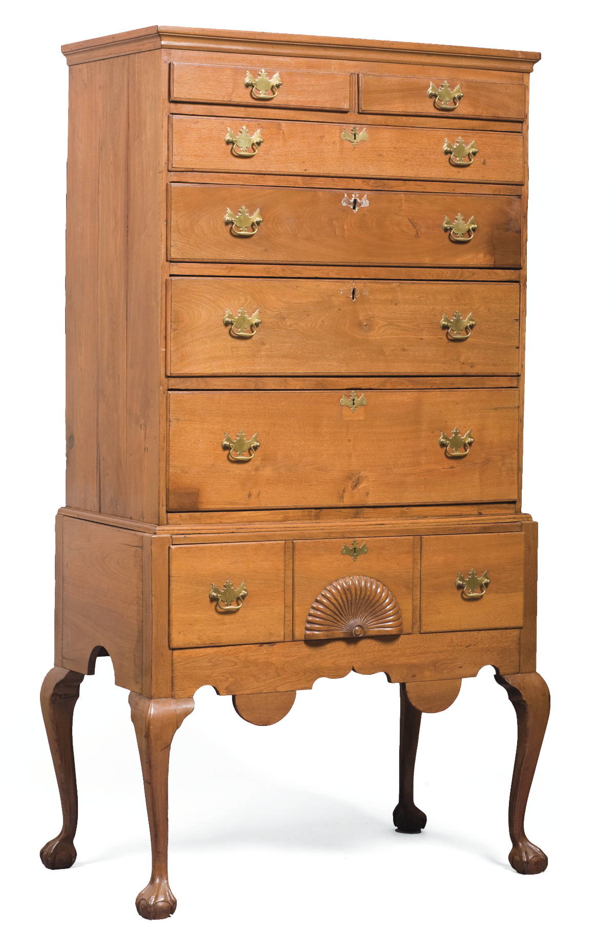 Appraisal: AMERICAN CARVED WALNUT HIGHBOY The lower section with central shell-carved